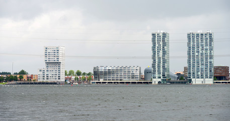 Fototapeta premium Skyline of a city along a lake