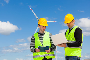 Two Engineers in a Wind Turbine Power Station