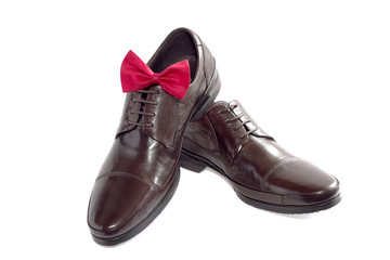 Concept of a fashion for the man - shoes and bow tie