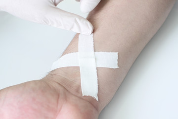 plaster on the hand the patient