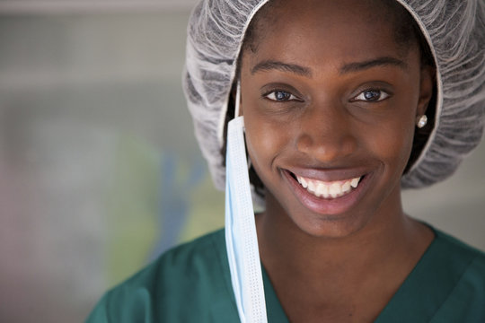 Black surgeon in surgical cap