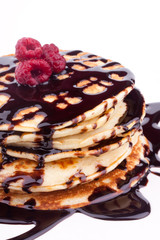 stack of pancakes with chocolate sauce