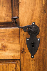 old wood door with metal handle
