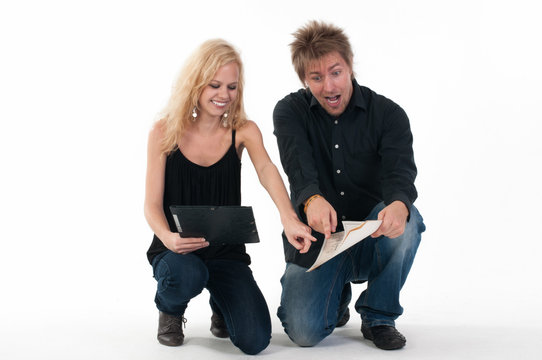 Boy and girl crouch