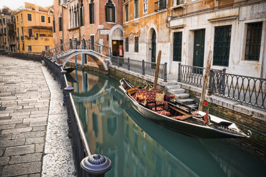 Gondola moored in canal