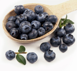 Ripe blueberries  close up isolated on white