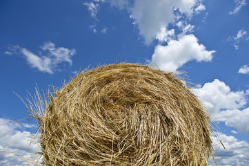 haystack and blue skies 