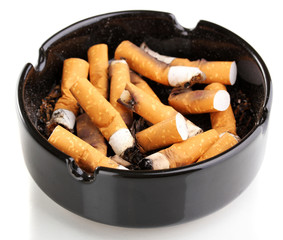 Cigarette butts in ashtray isolateed on white