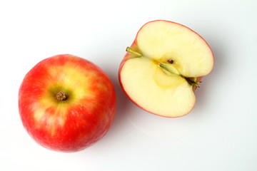 Naklejka na ściany i meble One red apple and slice