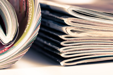 A large stack of magazines piled high.