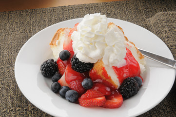 Gourmet dessert with berries and angle food cake