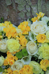 yellow and white floral arrangement