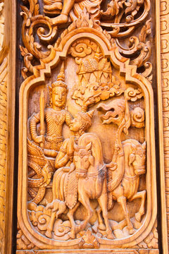 Carved wood thai temple