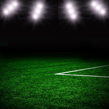 Soccer ball on the green field