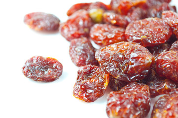 Italian sun dried tomatoes on white background.