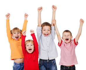 Happy children with their hands up