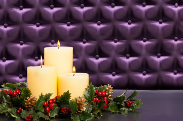 Advent flower arrangement with burning candles