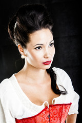 attractive brunette woman isolated on black