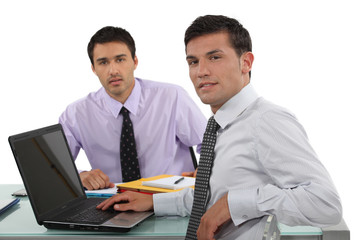 Two male office workers