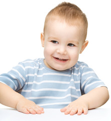 Portrait of a cute cheerful little boy