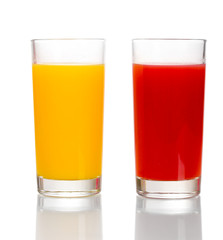 Tropical juices in glasses isolated on white