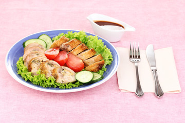 Tasty meat cutlet with garnish on plate