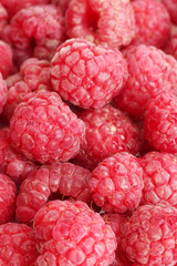 ripe raspberries background.