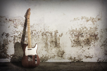 Fototapeta premium electric guitar on grunge scene