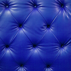 Close up blue luxury buttoned black leather