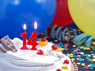 Birthday cake with red candles showing Nr. 14