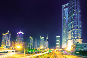 Fototapeta premium the light trails on the modern building background
