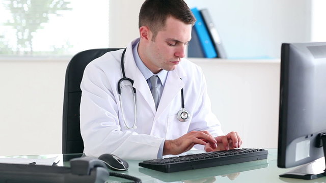 Doctor working on a computer