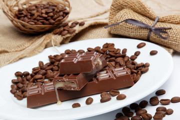 Chocolate and coffee beans on sacking.