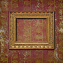 Vintage mockup, golden frame on burgundy grunge wallpaper