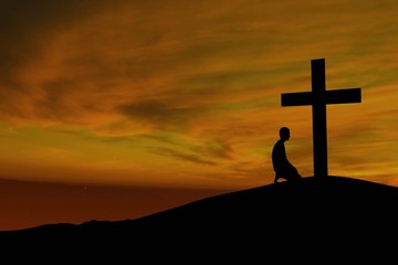 A mountain cross with a prayer