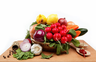Healthy food. Fresh vegetables and fruits on a wooden board.