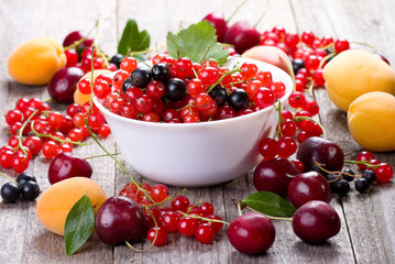still life with fruits and berries