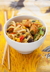 Noodles with chicken and vegetables in chinese style