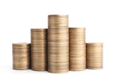 Bronze coins stand vertically in columns