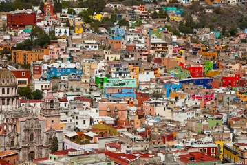 Poster Colorful houses on the hills © emattil