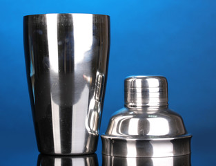Cocktail shaker on blue background