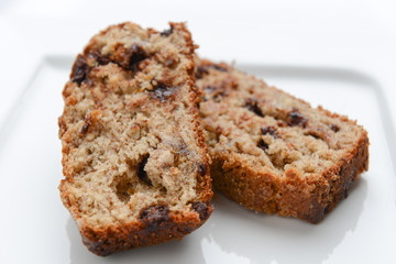 Slices of delicious banana bread on a white plate