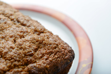 Delicious moist banana bread on a white plate