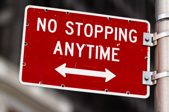 No stopping anytime road sign