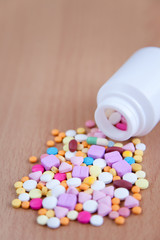 Medicines on wood background2