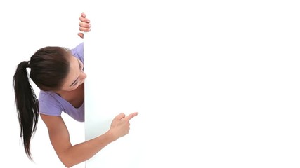 Pretty woman pointing something on a board - Powered by Adobe