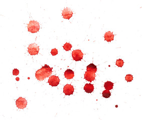Red blots of watercolor paint
