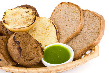 tasty baked with ears of wheat, isolated on a white background
