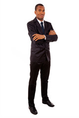 Full body portrait of a successful African young business man, i