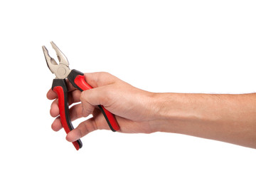 Male hand hold a black and red pliers